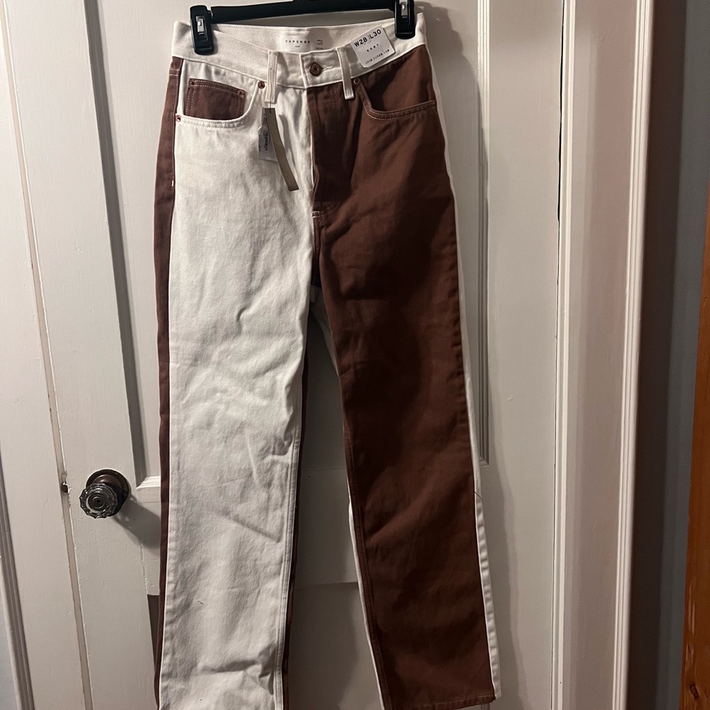 Top Shop Jeans that are a brown and off white color size women’s 28!